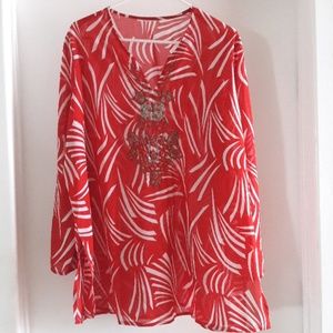 Gorgeous semi-sheer, long-sleeve blouse